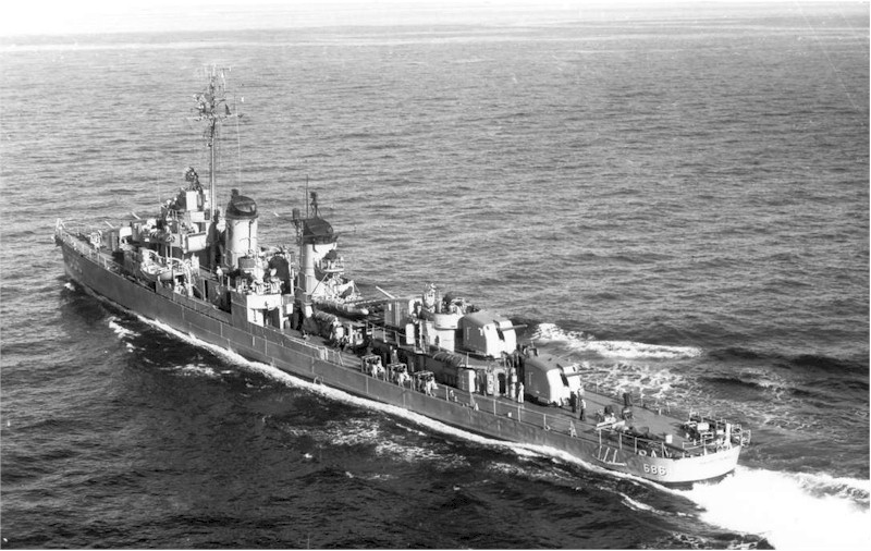 An aerial photograph of the USS Halsey Powell (DD-686) underway during the 1950s. An aerial photograph of the USS Halsey Powell (DD-686) underway during the 1950s.